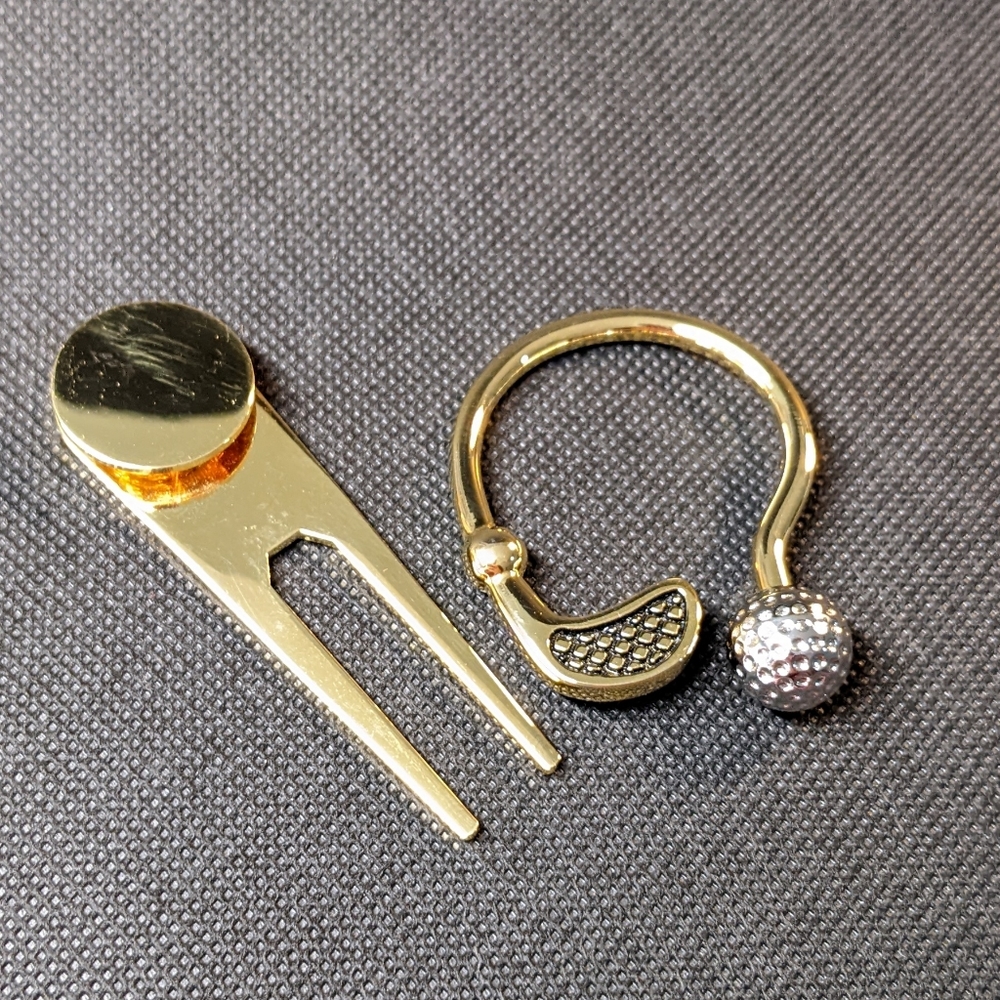 Set of golf themed keychain and divot tool. Gold. New.
